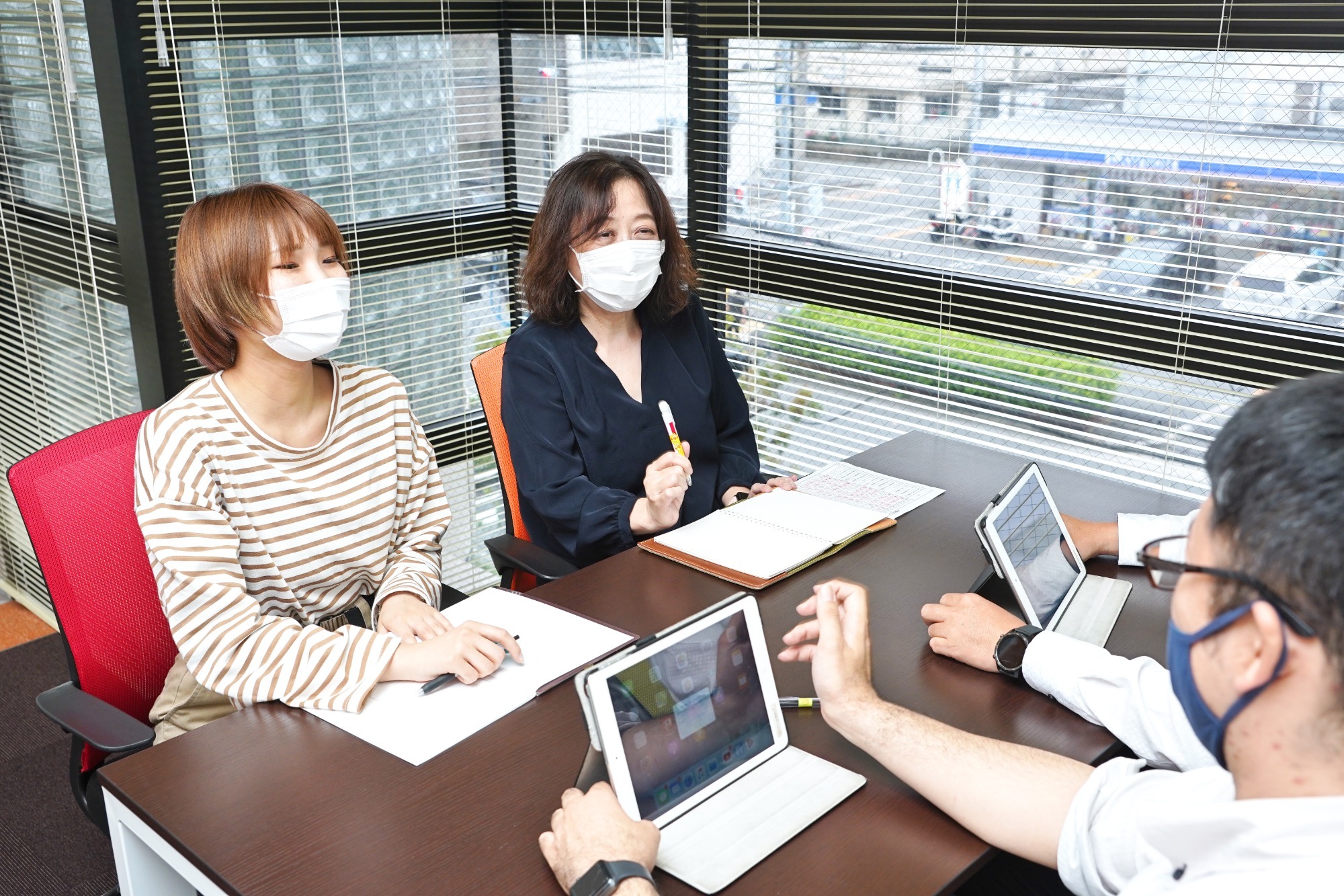 写真：営業職　〇〇〇さん